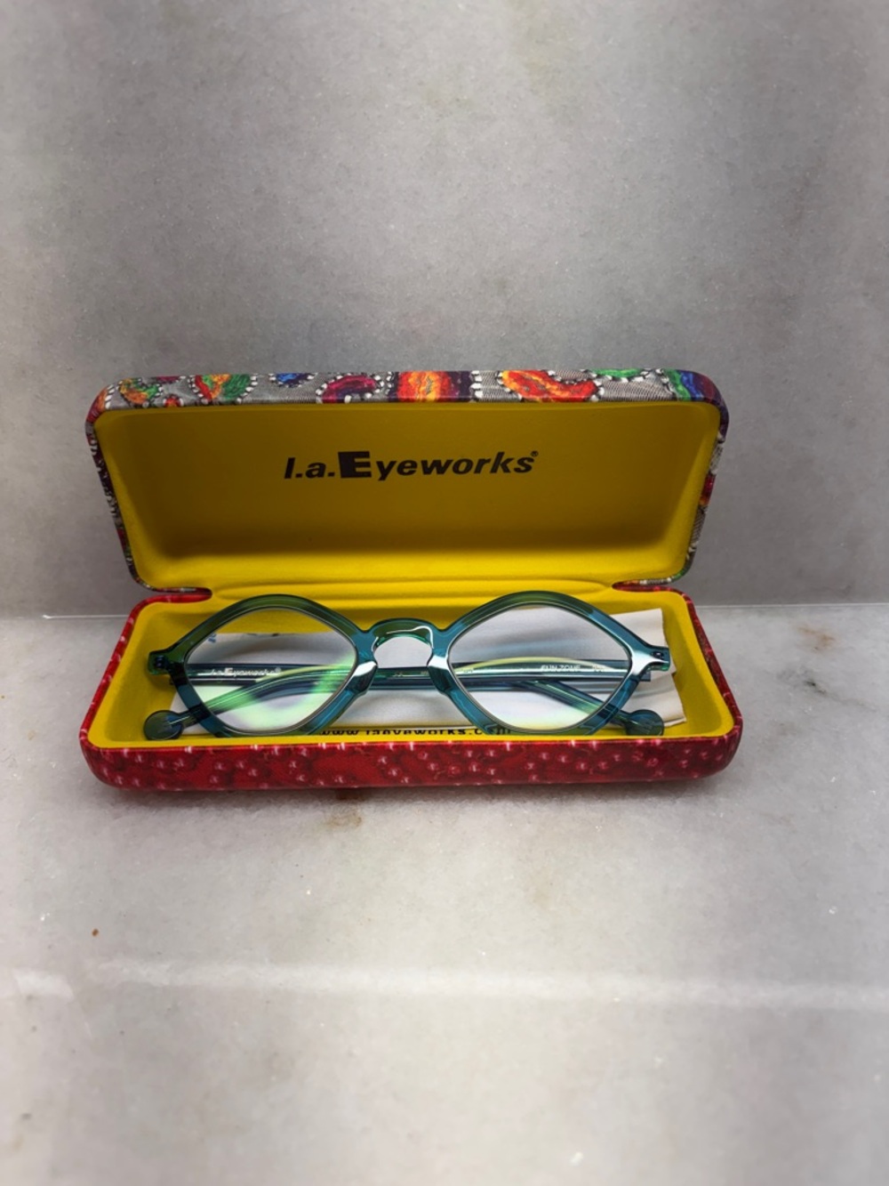 LA Eyeworks Teal Round Women's Eyeglass frames